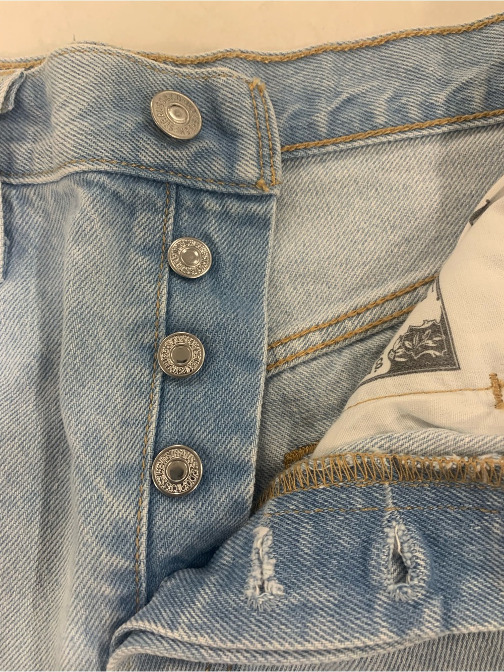 Levi's Light Blue Distressed Denim Cutoff Shorts - Picture 6 of 10